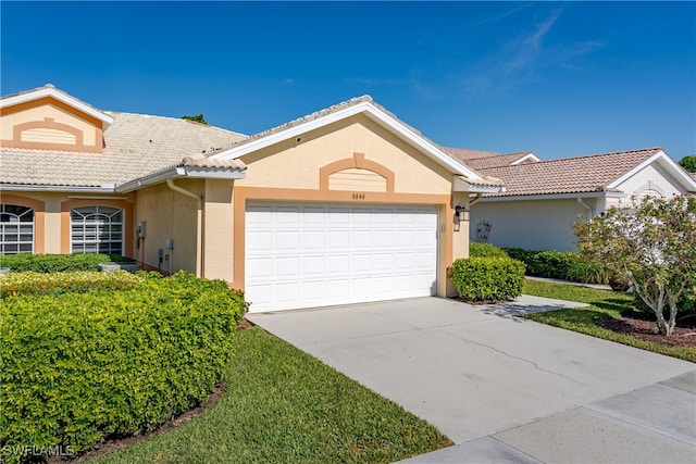 ranch-style house with a garage