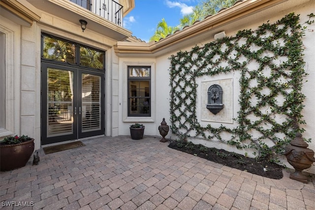 doorway to property featuring french doors and a patio