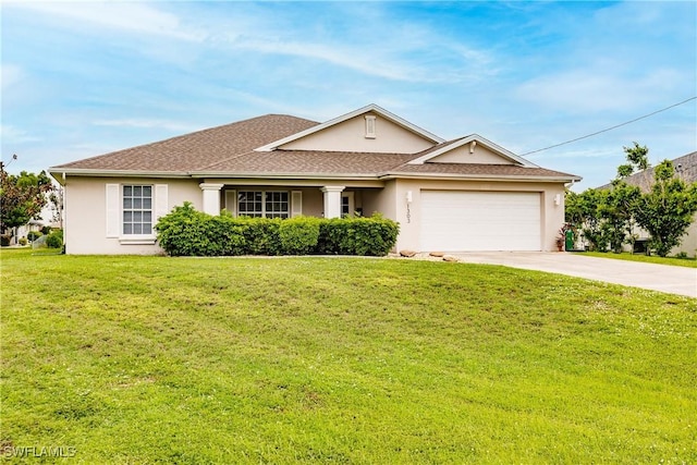 single story home featuring a garage and a front yard