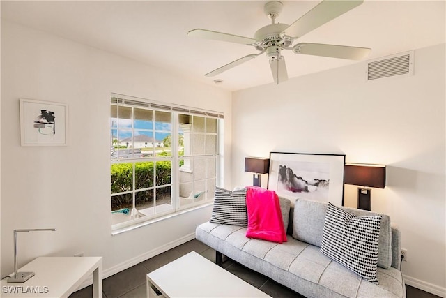 interior space featuring ceiling fan