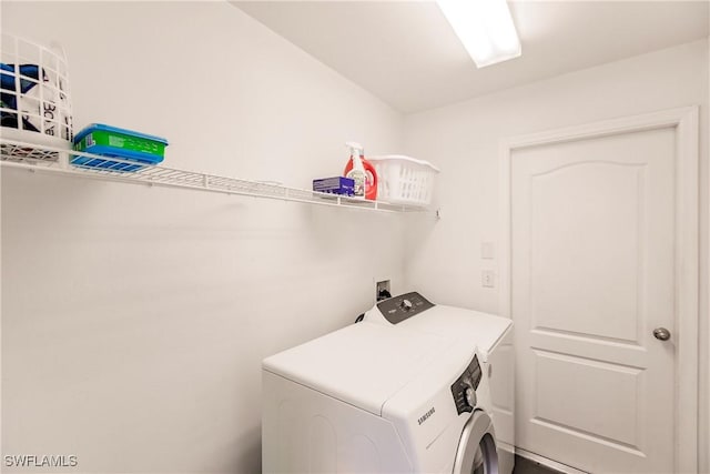 laundry room with washer and dryer