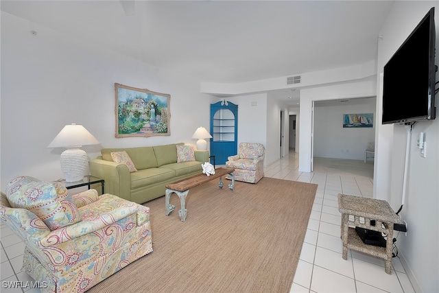 living room with light tile patterned floors