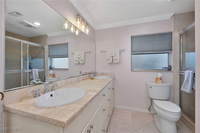 full bathroom featuring toilet, ornamental molding, a sink, and visible vents