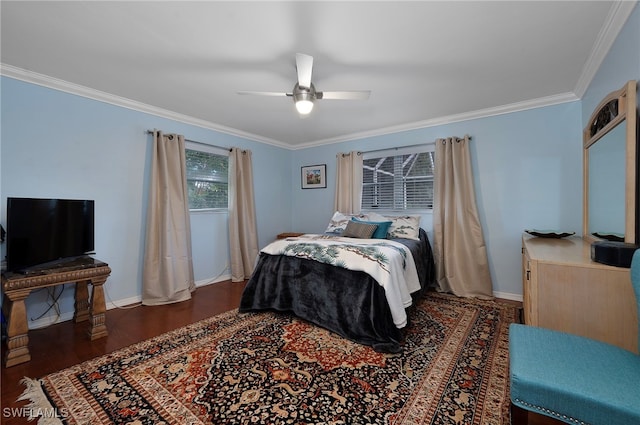 bedroom with baseboards, ornamental molding, ceiling fan, and dark wood-style flooring