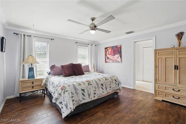 bedroom featuring baseboards, visible vents, dark wood-style floors, and ornamental molding