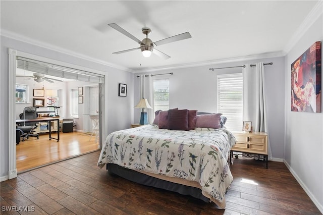 bedroom featuring wood-type flooring, a ceiling fan, baseboards, and crown molding