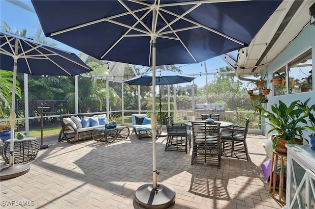 view of patio / terrace featuring outdoor lounge area, fence, and outdoor dining space