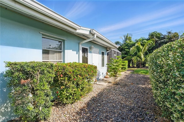 view of property exterior with stucco siding