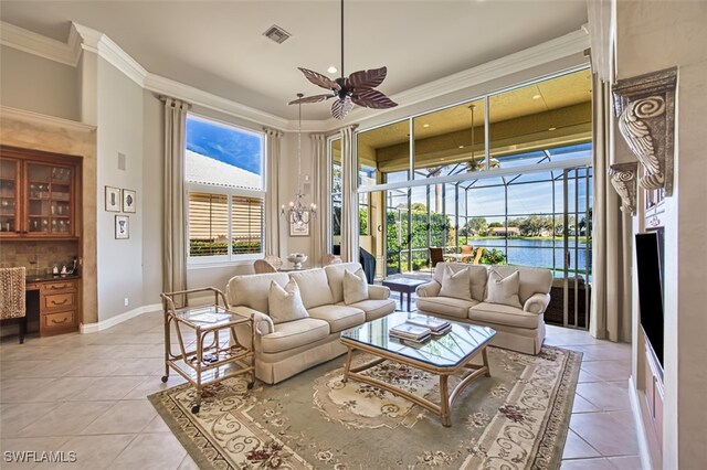 sunroom with ceiling fan and indoor bar