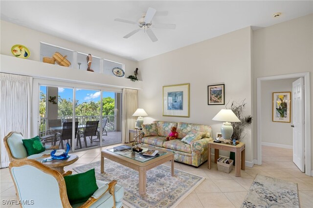 living room featuring ceiling fan and light tile patterned floors