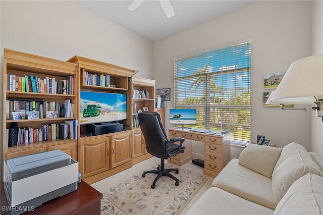 office area featuring ceiling fan and light tile patterned floors