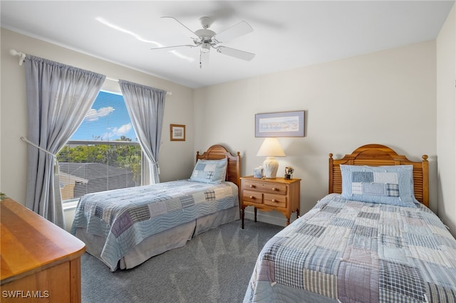 carpeted bedroom featuring ceiling fan