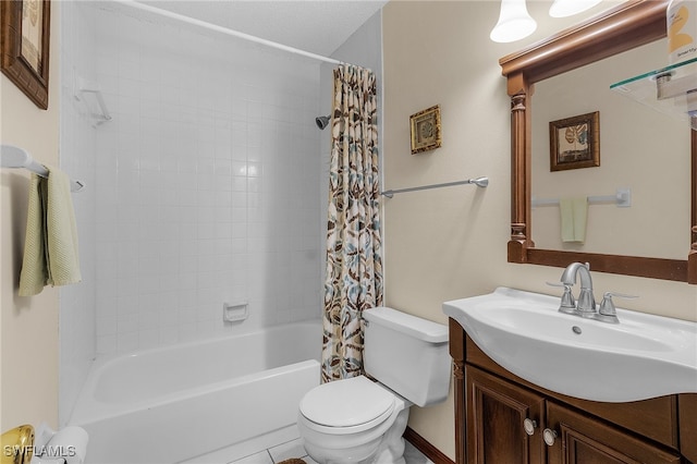 full bathroom with tile patterned floors, shower / tub combo with curtain, vanity, and toilet