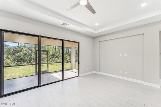 spare room with ceiling fan