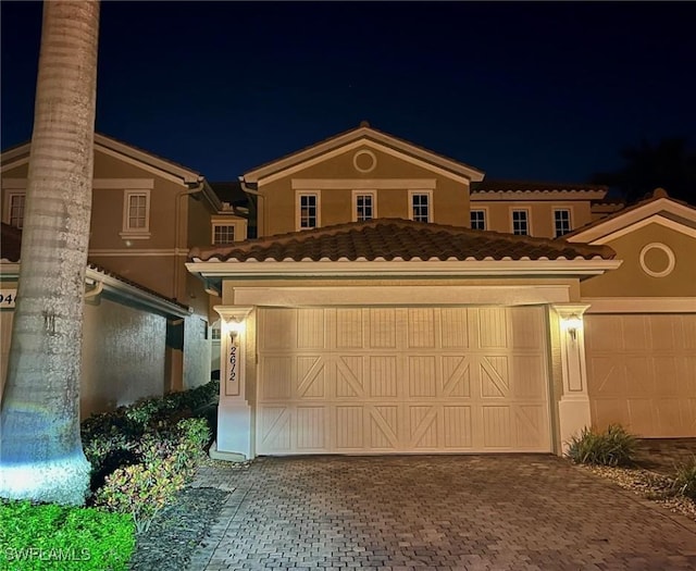 view of front of property featuring a garage