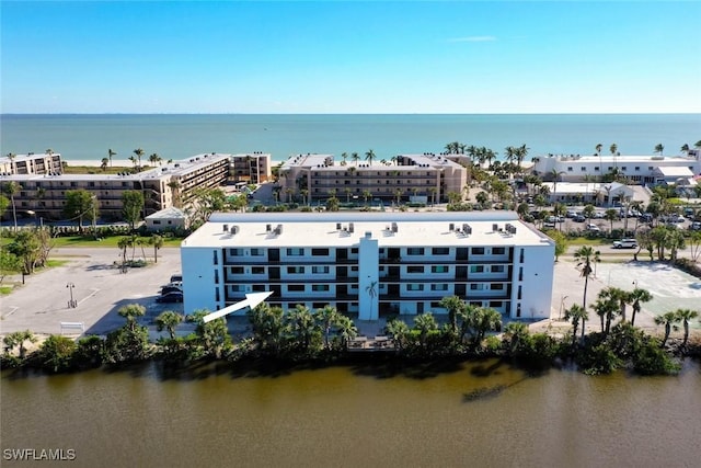 drone / aerial view with a water view