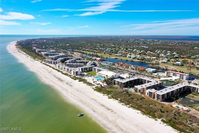 aerial view featuring a water view and a view of the beach