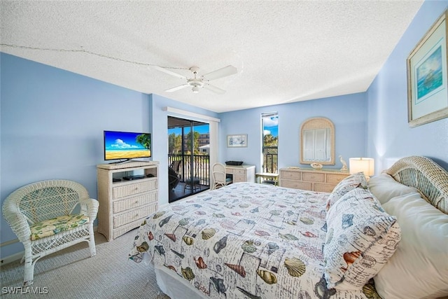 bedroom featuring carpet, ceiling fan, access to exterior, and a textured ceiling