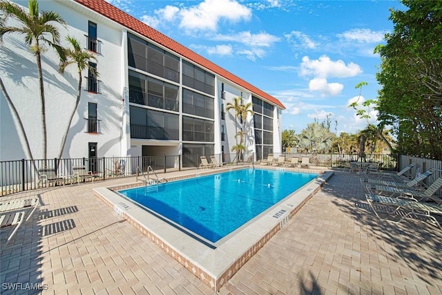 view of pool with a patio