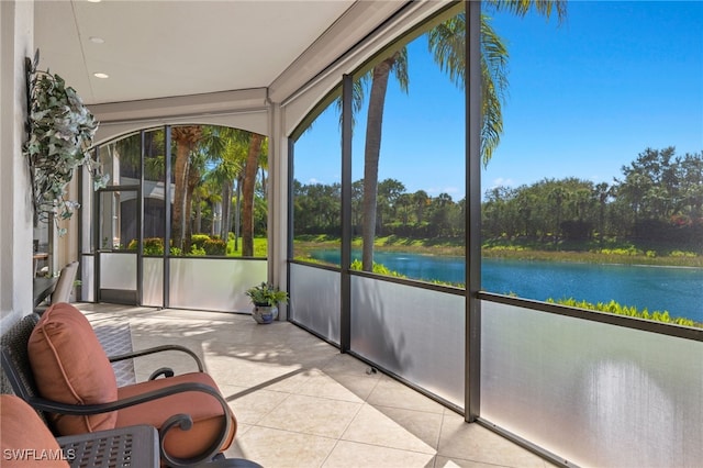 sunroom with a water view