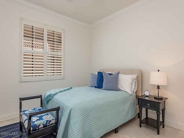 bedroom with light tile patterned floors and ornamental molding