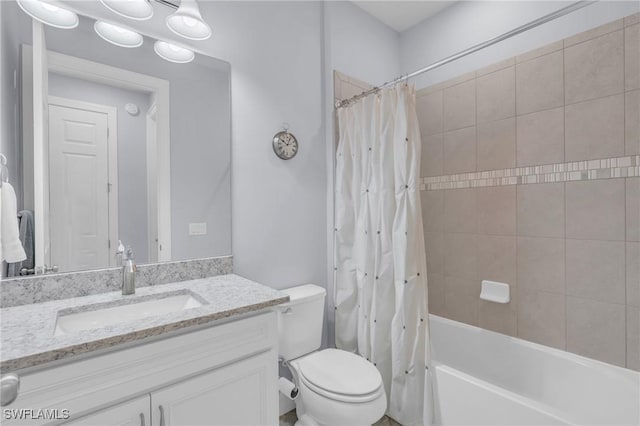 full bathroom featuring vanity, toilet, and shower / bathtub combination with curtain