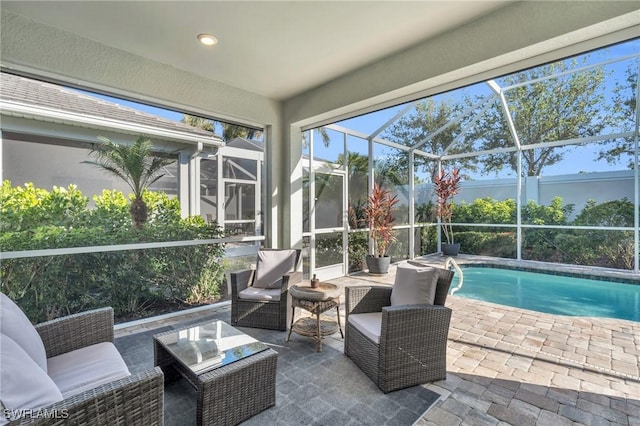 sunroom / solarium with a swimming pool