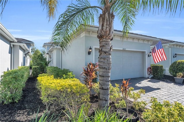 view of property exterior with a garage