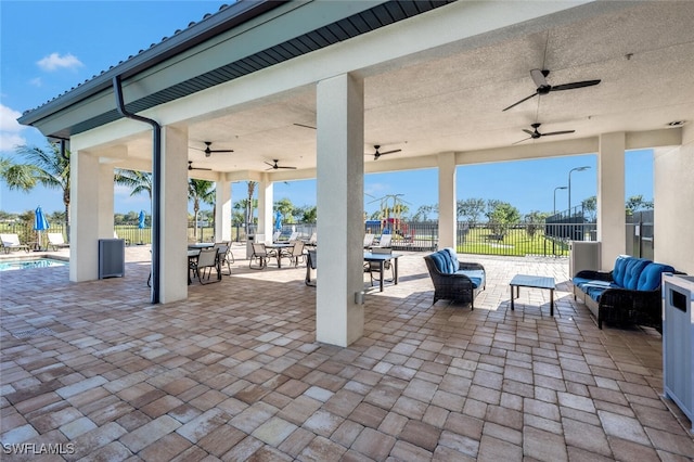 view of patio / terrace with outdoor lounge area and a fenced in pool