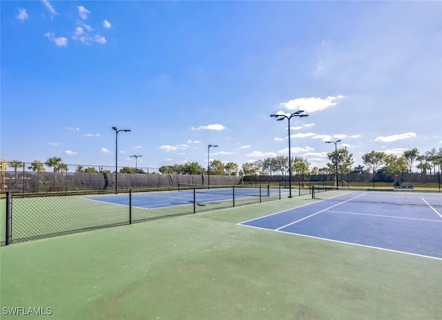 view of tennis court with basketball court