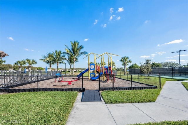 view of play area featuring a lawn