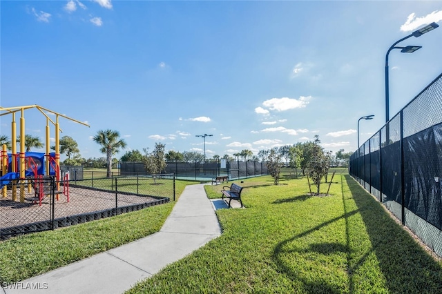 view of jungle gym with a yard