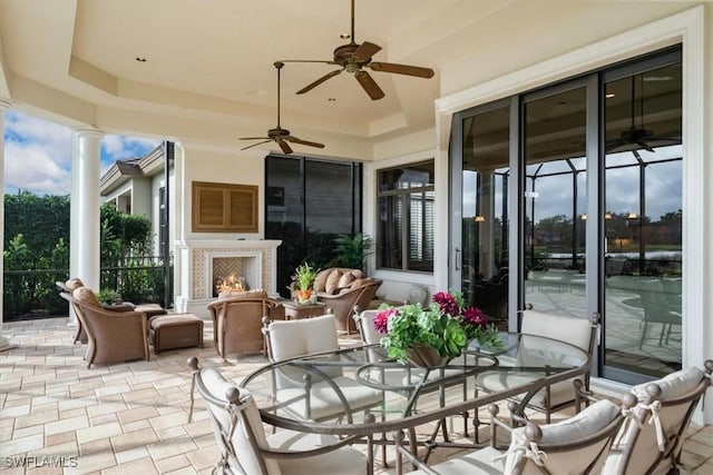 view of patio featuring ceiling fan