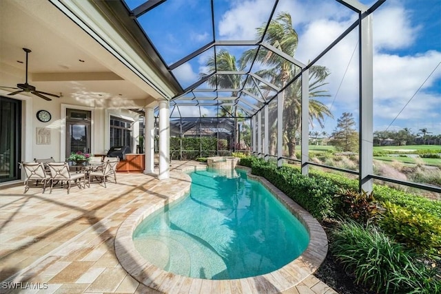 view of pool featuring a lanai, a patio area, ceiling fan, and a grill