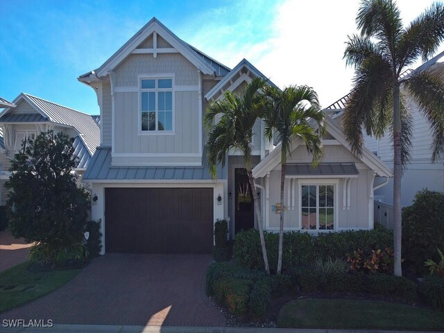 craftsman-style home with a garage