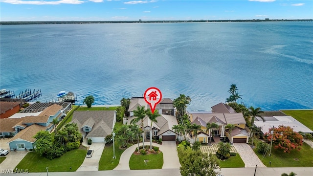 drone / aerial view with a water view