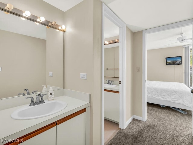 bathroom with vanity and ceiling fan