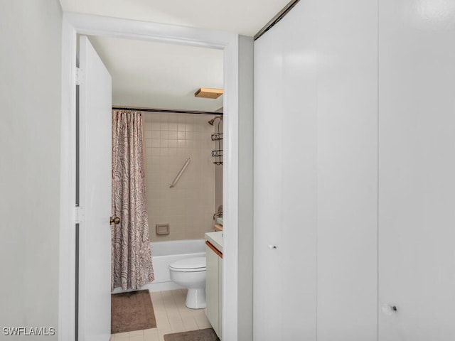 full bathroom with tile patterned floors, vanity, toilet, and shower / bathtub combination with curtain