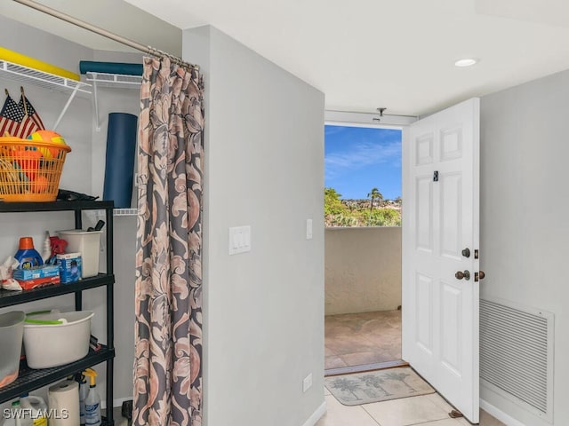 interior space with tile patterned floors