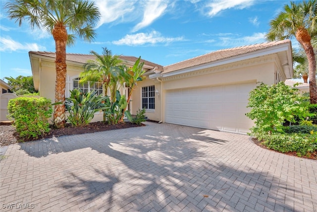 view of front of property with a garage