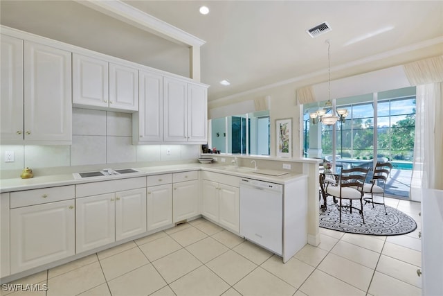 kitchen featuring light tile patterned floors, white appliances, decorative light fixtures, and white cabinetry