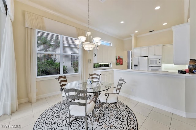 dining room with light tile patterned floors, crown molding, and a notable chandelier