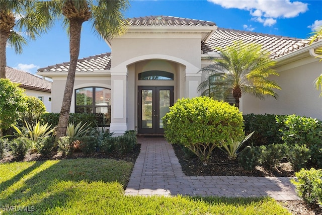 view of exterior entry with french doors