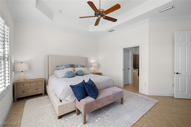 tiled bedroom with ceiling fan, crown molding, and a tray ceiling