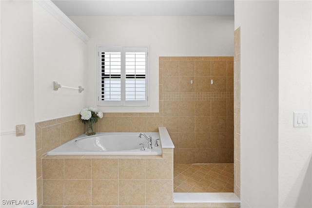 bathroom featuring separate shower and tub