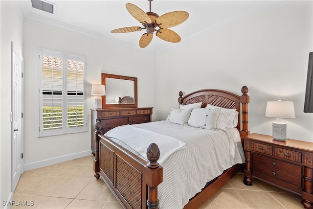 bedroom featuring light tile patterned floors, ceiling fan, and ornamental molding