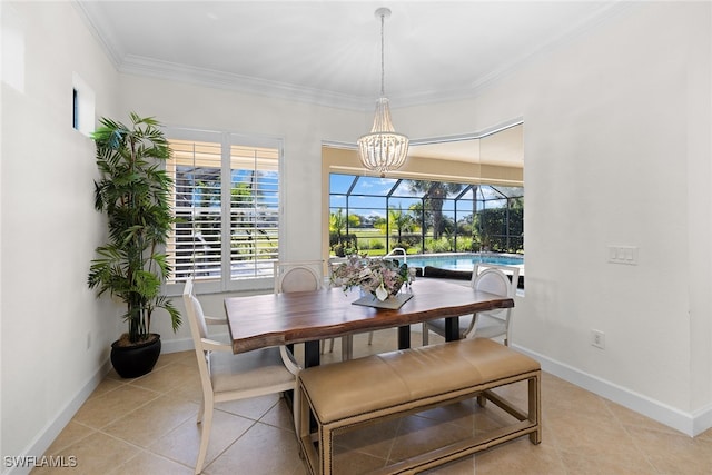 dining room with an inviting chandelier, crown molding, a healthy amount of sunlight, and light tile patterned flooring