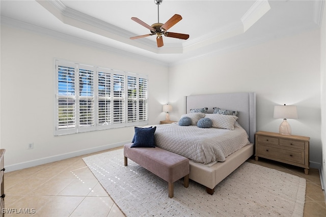 tiled bedroom with a raised ceiling, ceiling fan, and crown molding