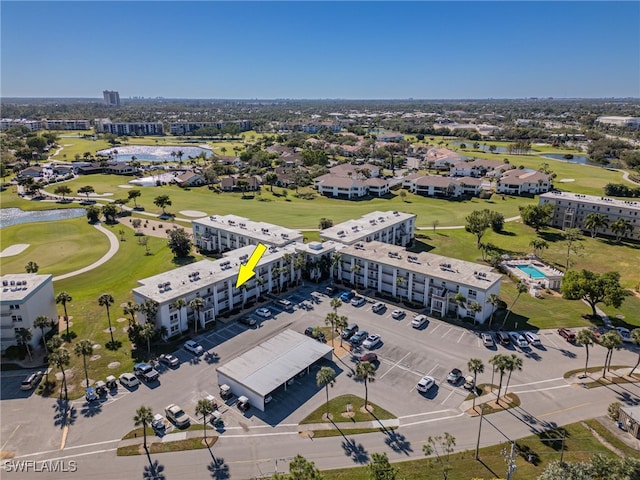 birds eye view of property featuring view of golf course