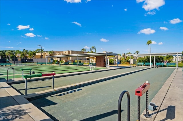 view of home's community with fence